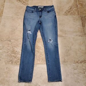 Levi's 711 skinny distressed jeans